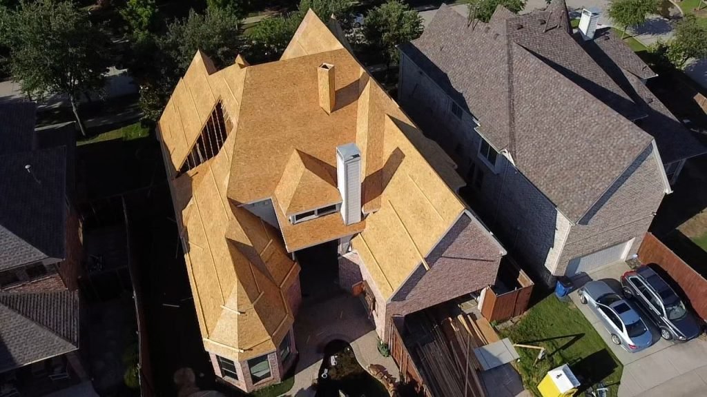 New roof getting installed on large home.