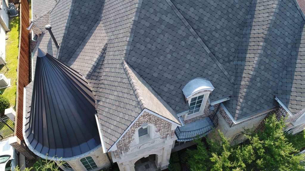 Synthetic tile roof on large home.