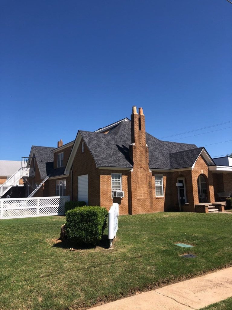 Home with asphalt shingle roof.
